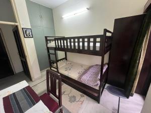 Postel nebo postele na pokoji v ubytování Happy Homestay