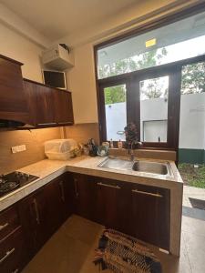 Kuchyň nebo kuchyňský kout v ubytování Asirima Villas