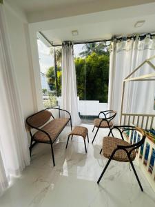 Balkón nebo terasa v ubytování Asirima Villas