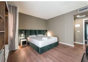Postel nebo postele na pokoji v ubytování Ajsel Hotel