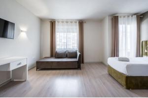 Postel nebo postele na pokoji v ubytování Ajsel Hotel