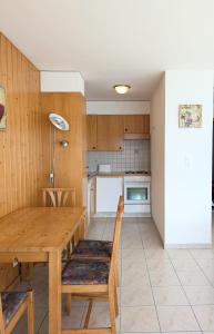Kuchyň nebo kuchyňský kout v ubytování Appartement Thermal Ovronnaz 3 Pieces