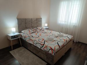 Postel nebo postele na pokoji v ubytování Apartman BFF