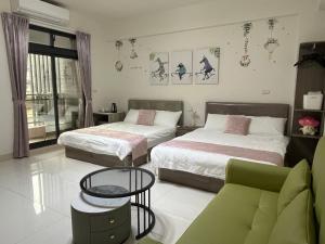 Postel nebo postele na pokoji v ubytování Sunshine Fonda Homestay
