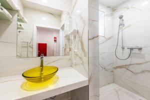 Koupelna v ubytování YS Apartments + 23 fotografií