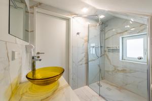 Koupelna v ubytování YS Apartments