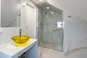 Koupelna v ubytování YS Apartments