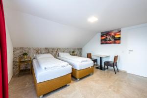 Postel nebo postele na pokoji v ubytování YS Apartments