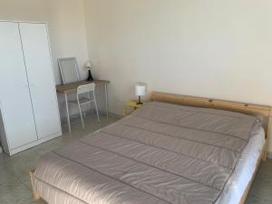 A bed or beds in a room at A Casa Tua