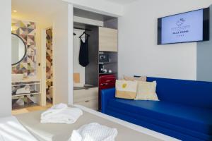 Posteľ alebo postele v izbe v ubytovaní Tuscany Hotel Alle Dune