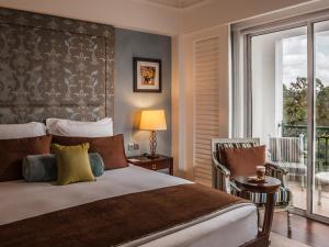 Postel nebo postele na pokoji v ubytování Villa Rosa Kempinski