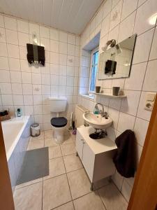 Koupelna v ubytování Ferienwohnung Sill Im Herzen Ostfrieslands