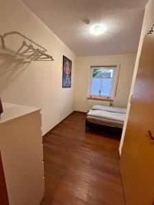 Postel nebo postele na pokoji v ubytování Ferienwohnung Sill Im Herzen Ostfrieslands