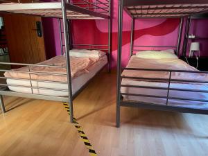 A bed or beds in a room at Bed Madrid Rooms by Bossh! Hotels Még 37 kép