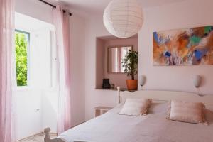 Postel nebo postele na pokoji v ubytování Art Apartment SeaSoul