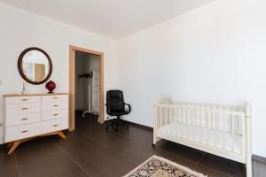 Postel nebo postele na pokoji v ubytování Intera villa ad uso esclusivo con 2 bagni 4 camere da letto,garage,giardino,area fitness,lavatrice,wifi