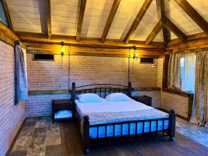 Voodi või voodid majutusasutuse Getahovit Resort toas