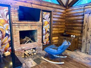 Televiisor ja/või meelelahutuskeskus majutusasutuses Getahovit Resort