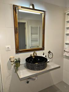 Et badeværelse på Boutique apartment