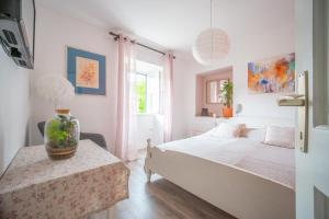 Postel nebo postele na pokoji v ubytování Art Apartment SeaSoul