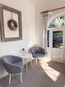 Posezení v ubytování Halháza Erdészlak Apartman