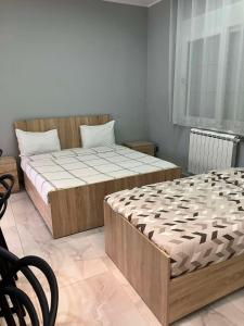 Postel nebo postele na pokoji v ubytování Hôtel Mon Royaume + 10 fotografií