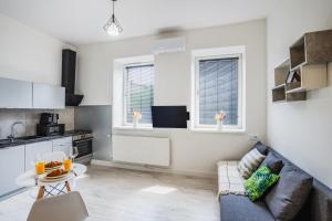 Kuchyň nebo kuchyňský kout v ubytování Apartment Quiet Street 11/5E