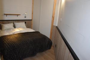 Postel nebo postele na pokoji v ubytování VAUJANYLOCATIONS - Cochette 1 appartement 14 bis