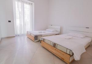 Postel nebo postele na pokoji v ubytování Appartamento a pochi minuti a piedi dalla spiaggia di Riva Trigoso - Sestri Levante - "Al Mare con noi"