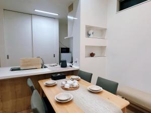 Fotografie z fotogalerie ubytování 和悦岸里玉出 v Osace
