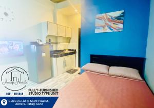 Katil atau katil-katil dalam bilik di Amplayo Apartelle Fully-Furnished Studio Type Apartment