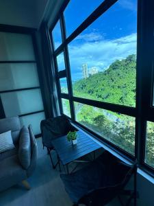 Χώρος καθιστικού στο Jesselton Quay- 2Bedrooms modern concept-free wifi & netflix