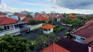an aerial view of a town with houses and roofs at Casa Shanti in Nusa Dua +6 photos