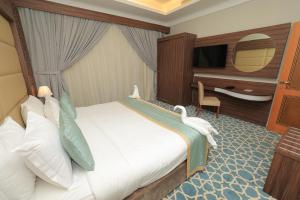 Postel nebo postele na pokoji v ubytování Dimond Vision Hotel