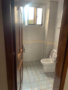 Koupelna v ubytování Apartment for rent in Kinshasa Gombe