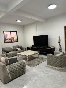 Μια τηλεόραση ή/και κέντρο ψυχαγωγίας στο Apartment for rent in Kinshasa Gombe