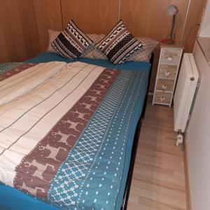 Ένα ή περισσότερα κρεβάτια σε δωμάτιο στο Ferienwohnung Haus Finkbeiner