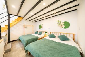 Una cama o camas en una habitación de 柃居 B&B - Jing'an Temple Branch