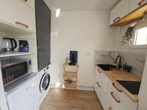 Køkken eller tekøkken på Studio moderne et calme