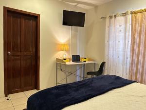 Postel nebo postele na pokoji v ubytování Master Suite Oro #1