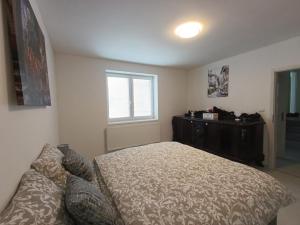 Postel nebo postele na pokoji v ubytování apartmán Fénix