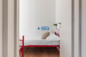 Łóżko lub łóżka w pokoju w obiekcie Condominio International