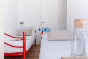 Łóżko lub łóżka w pokoju w obiekcie Condominio International