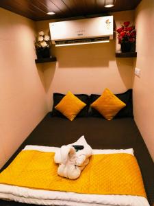 Voodi või voodid majutusasutuse Nadim Tiger Residency toas