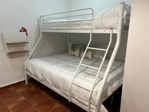 A bed or beds in a room at Alojamientos Rurales Cuatro Estaciones