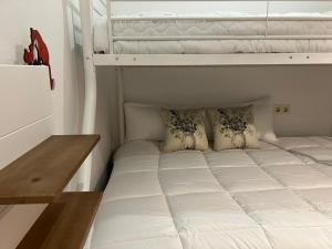 A bed or beds in a room at Alojamientos Rurales Cuatro Estaciones