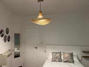 A bed or beds in a room at Alojamientos Rurales Cuatro Estaciones