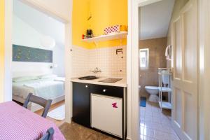 Kuchyň nebo kuchyňský kout v ubytování Art Apartment SeaSoul