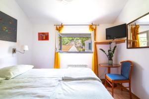 Postel nebo postele na pokoji v ubytování Art Apartment SeaSoul