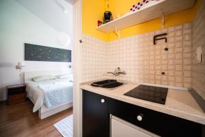 Kuchyň nebo kuchyňský kout v ubytování Art Apartment SeaSoul